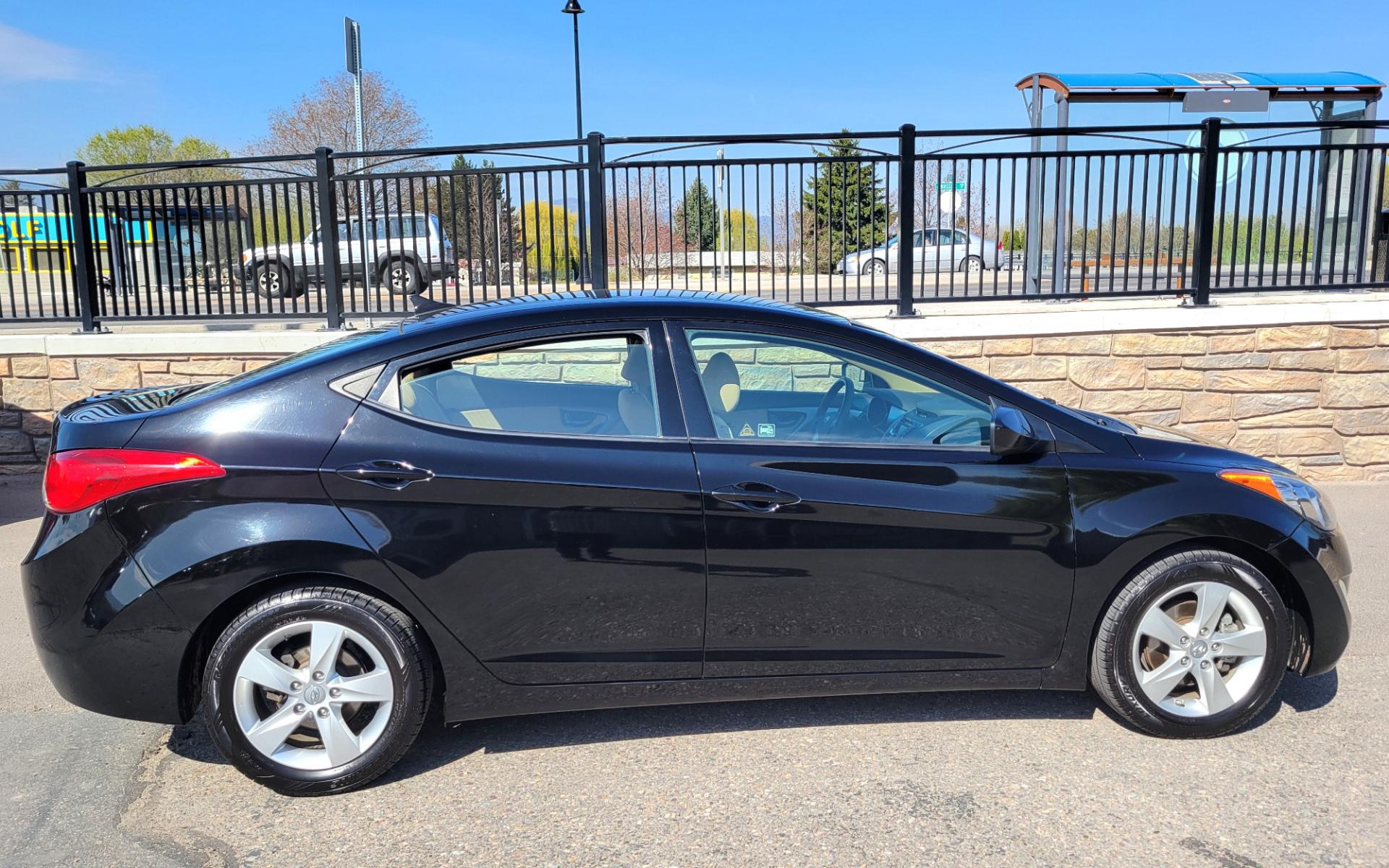 2013 Black /Tan Hyundai Elantra GLS (KMHDH4AE8DU) with an 1.8L I4 engine, 6 Speed Auto transmission, located at 450 N Russell, Missoula, MT, 59801, (406) 543-6600, 46.874496, -114.017433 - Low Mile Front Wheel Drive Sedan. One Owner. Excellent Fuel Economy. 1.8L I4 Engine. 6 Speed Automatic Transmission. AirConditioning. Power Windows and Locks. Bluetooth. - Photo #0